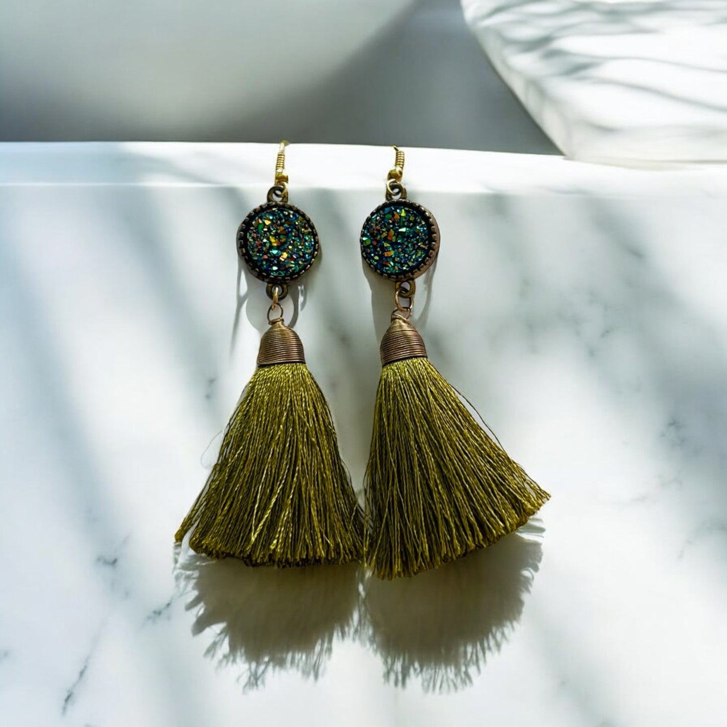 Aretes pompones